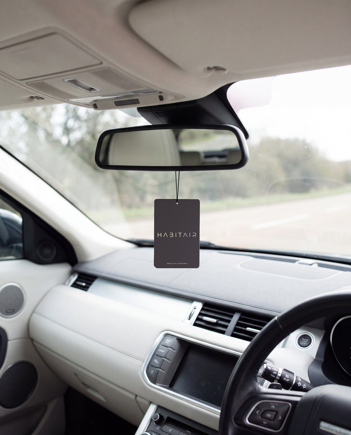 OCEANIS Classic hanging from a car's rear-view mirror