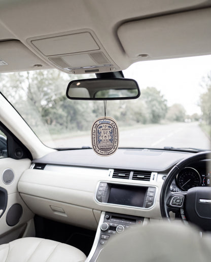 OCEANIS Premium Fragrance (Oval Edition) hanging from a car's rear-view mirror