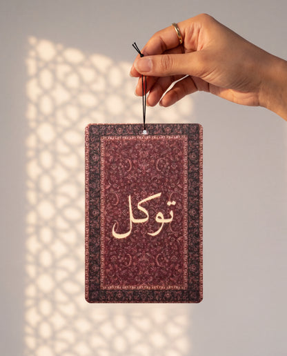 DESERT NOIR card held by its string