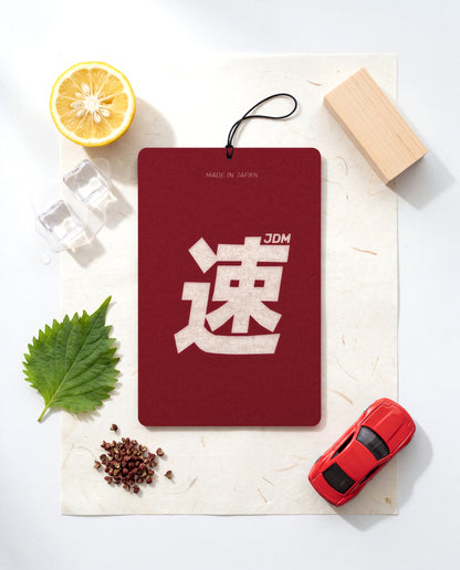JDM Spirit flat lay with its fragrance ingredients