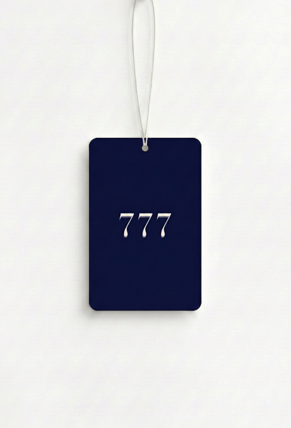 Navy blue luggage tag with '777' printed on it against a white background