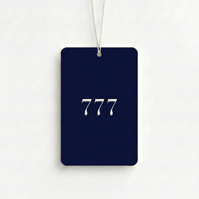 Navy blue luggage tag with '777' printed on it against a white background