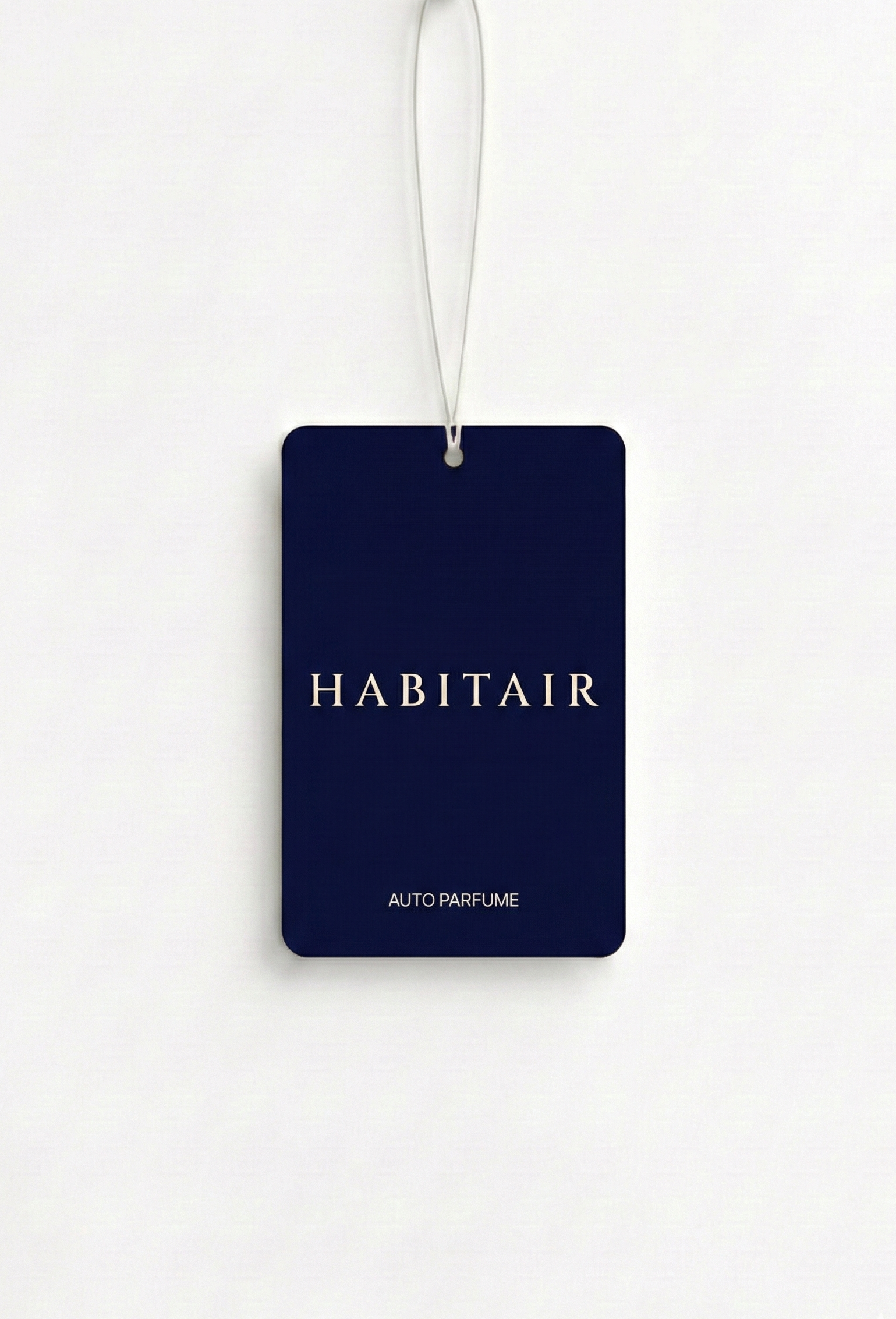 Navy blue air freshener tag with 'Habitair' branding on a white background