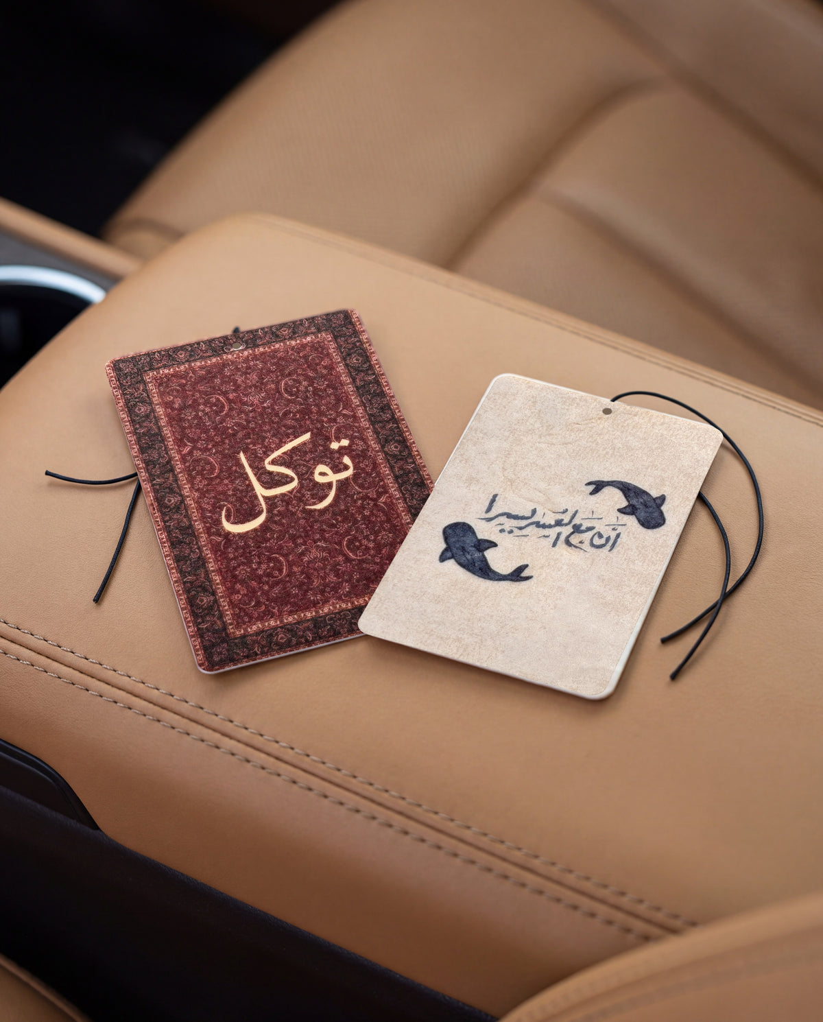 ARABIC DUO BUNDLE: Tawakkul and Ease in Every Journey car air freshener cards on a car interior detail