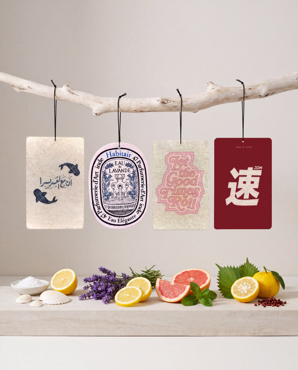 The Signature Bundle: Buy 3 Get 1 Free: Ease in Every Journey, Eau de Lavande, Let the Good Times Roll and JDM Spirit car air freshener cards displayed with their scent ingredients