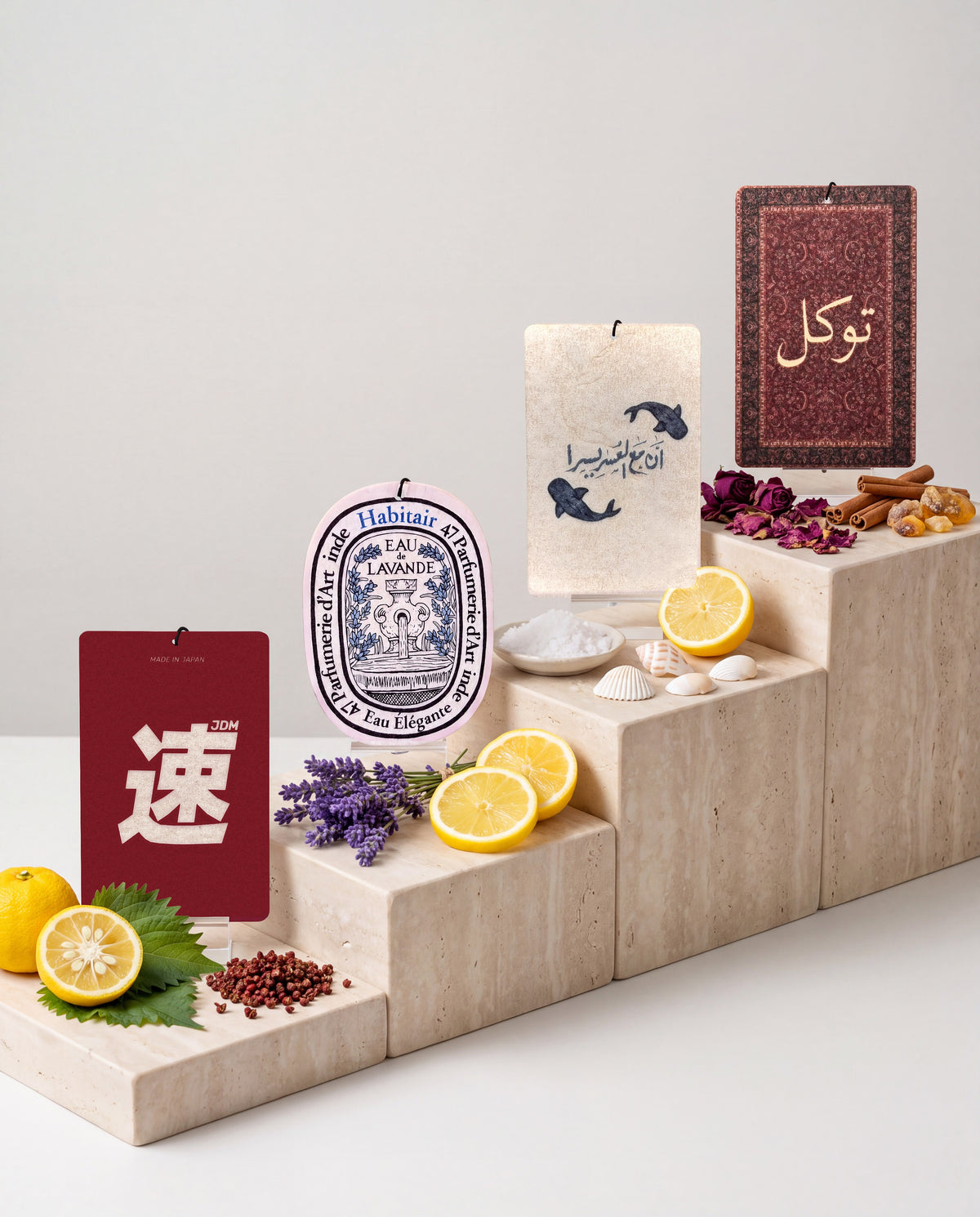 The Journey Bundle: Buy 3 Get 1 Free: JDM Spirit, Eau de Lavande, Ease in Every Journey and Tawakkul car air freshener cards displayed with their scent ingredients