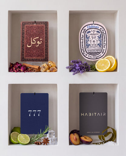 The Grand Tour Bundle: Buy 3 Get 1 Free: Tawakkul, Eau de Lavande, Lucky 777 and Habitair Classic car air freshener cards displayed with their scent ingredients