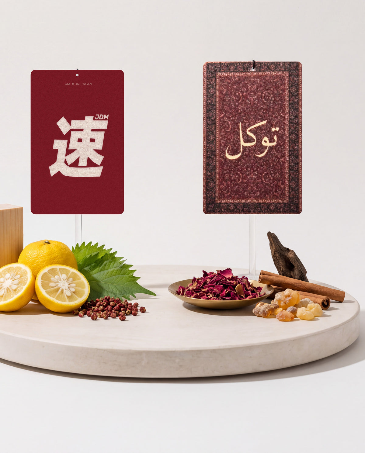 East Meets West DUO Bundle: JDM Spirit and Tawakkul car air freshener cards displayed with their scent ingredients