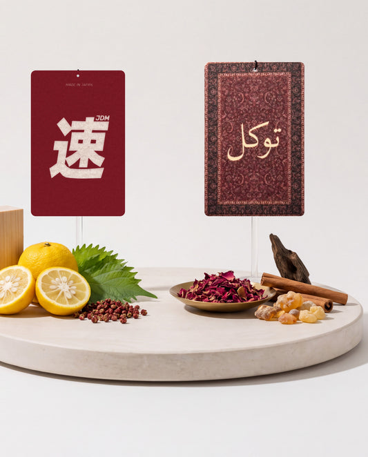 East Meets West DUO Bundle: JDM Spirit and Tawakkul car air freshener cards displayed with their scent ingredients