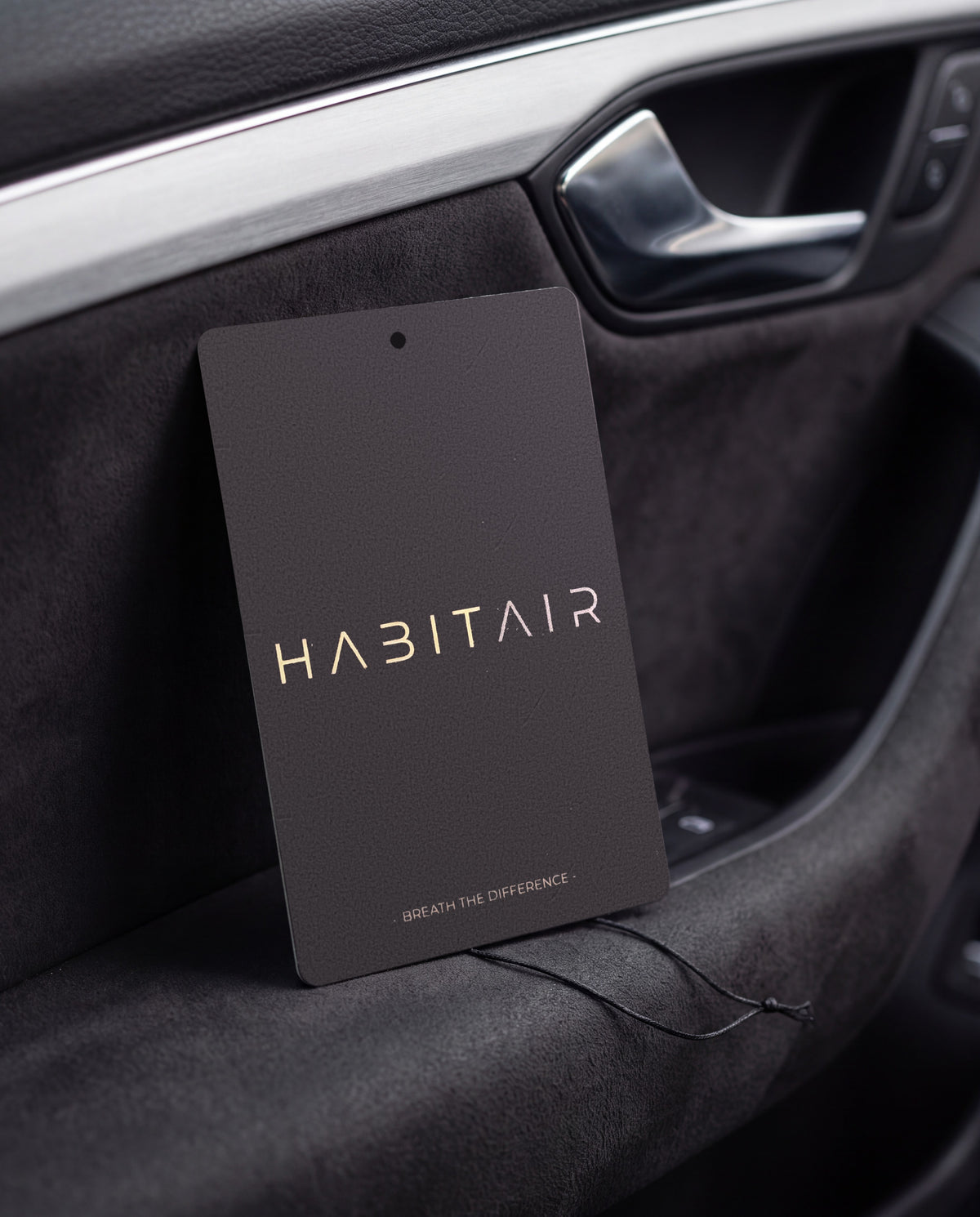 OCEANIS Classic car air freshener card on a car interior detail