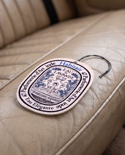 OCEANIS Premium Fragrance (Oval Edition) car air freshener card on a car interior detail