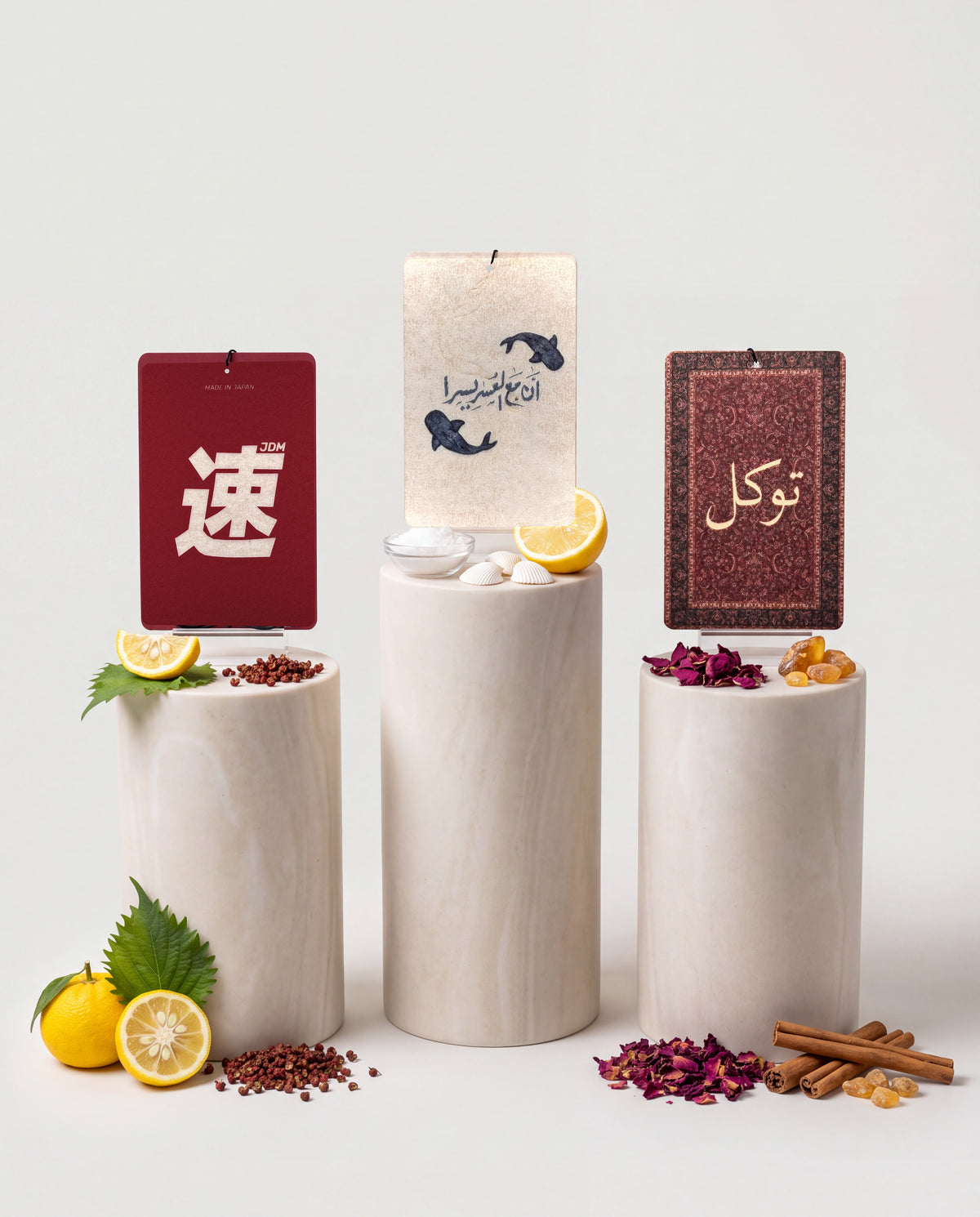 Habitair Trio: The CULTURE Collection: JDM Spirit, Ease in Every Journey and Tawakkul car air freshener cards displayed with their scent ingredients